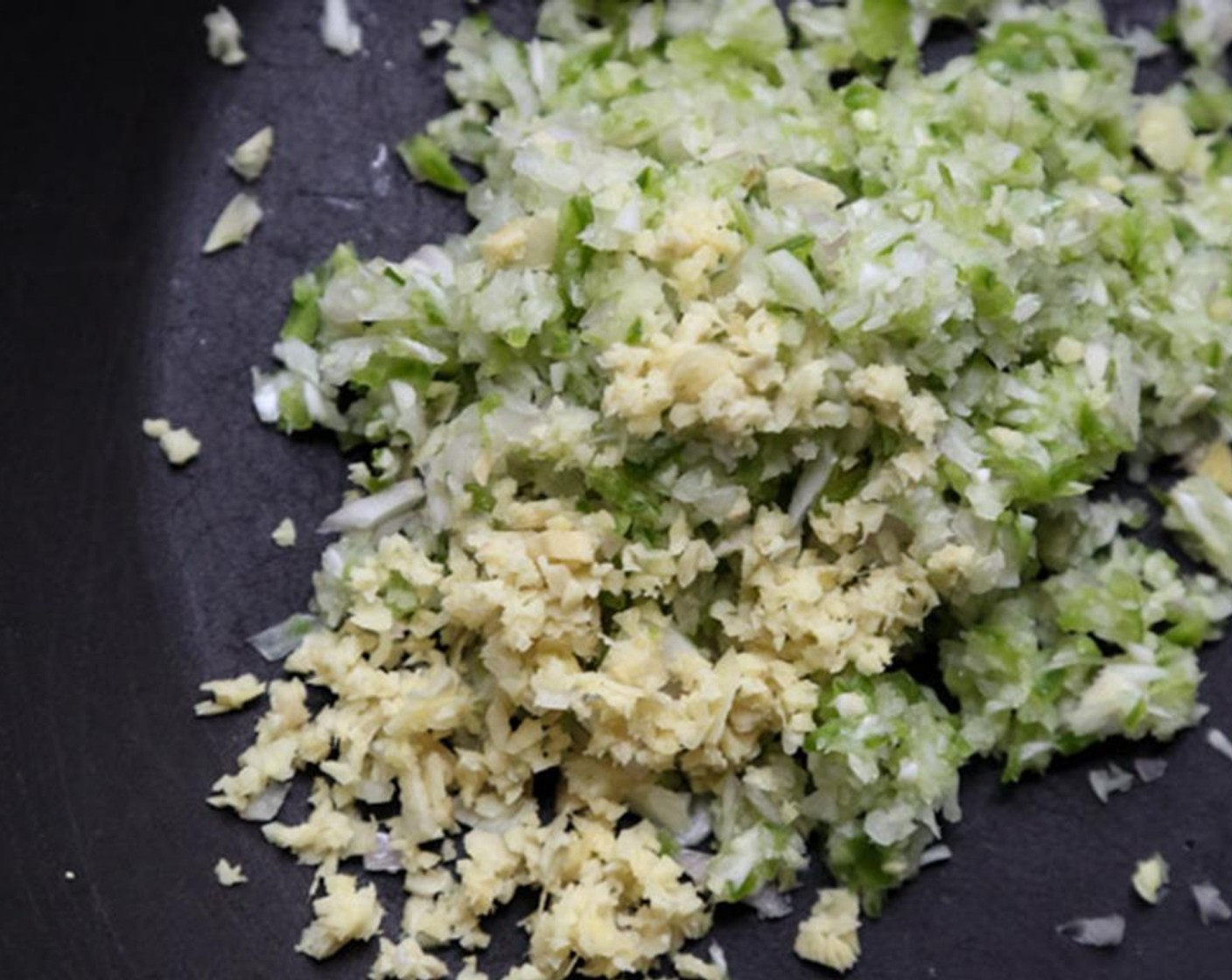 step 2 In a large bowl, combine the Ground Chicken (1 lb), Farmhouse Eggs® Large Brown Egg (1), Tomato Paste (2 Tbsp), Extra-Virgin Olive Oil (1 Tbsp), Fresh Mint (4 Tbsp), Garlic (2 cloves), Shallot (1), Ground Cumin (1/2 tsp), and Sea Salt (1 tsp).