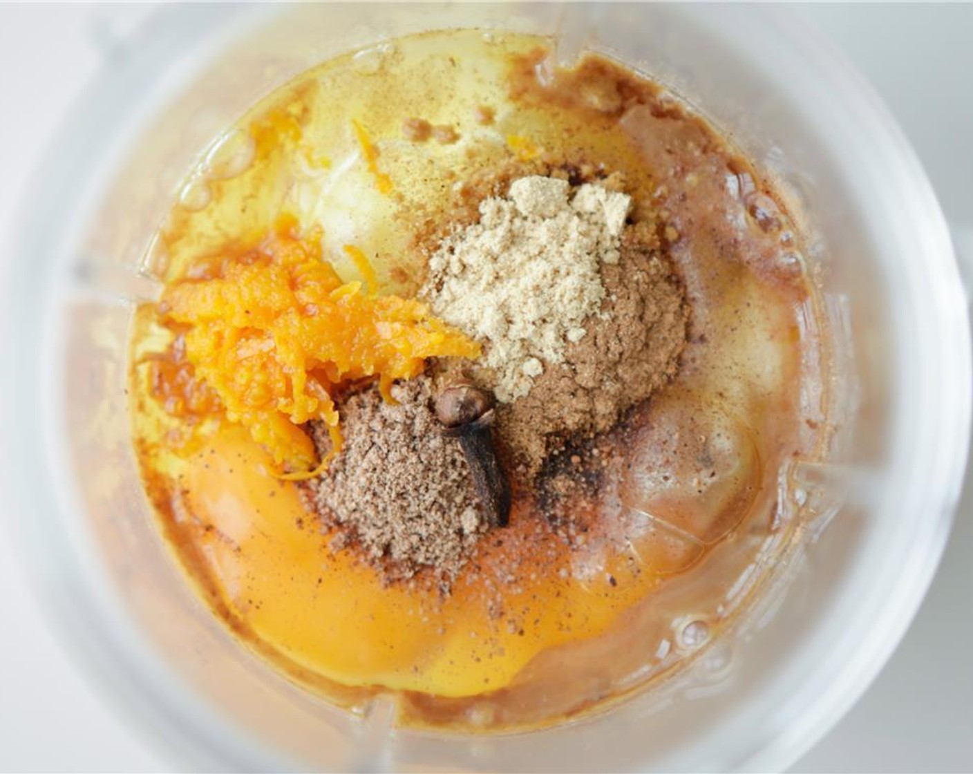 step 4 Place the bananas in a blender or magic bullet with Simply Organic Cinnamon, Ground (1/4 tsp), Eggland's Best Classic Eggs (2), orange rind, Ground Ginger (1/4 tsp), Ground Nutmeg (1/8 tsp), Ground Cloves (1/8 tsp), and Vanilla Extract (1 tsp).
