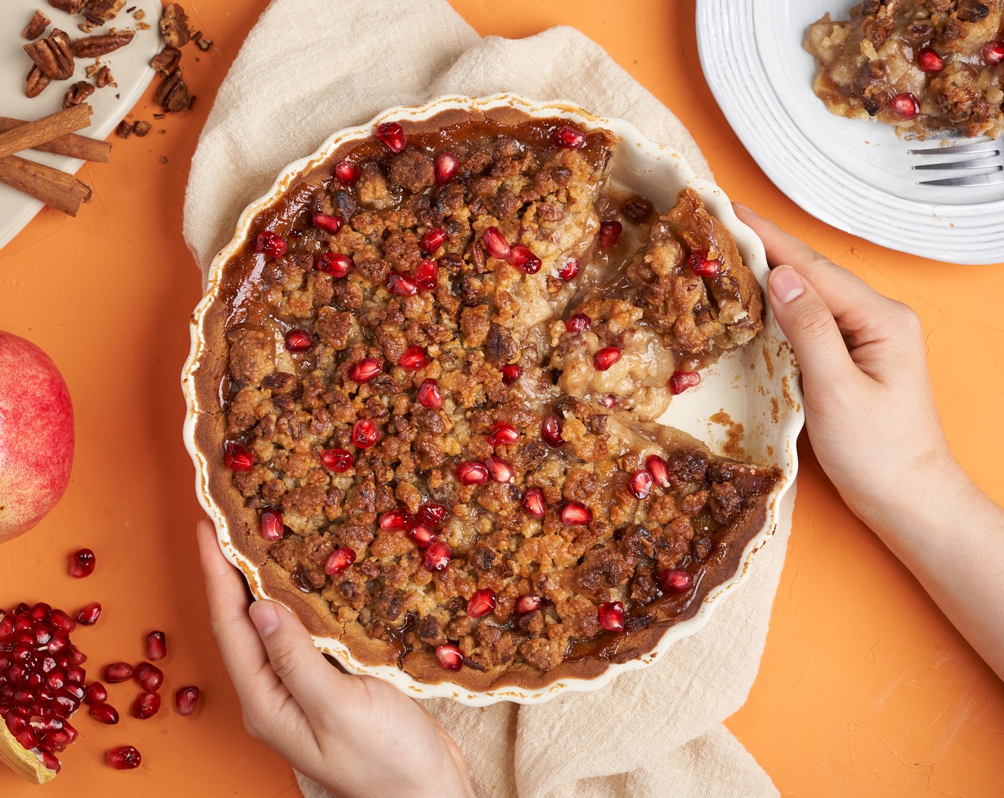 step 7 Remove from the oven, and allow to cool on the wire rack at least 2 to 3 hours before serving. Slice and serve with a  scoop of vanilla ice cream or whipped cream, if desired. Top with Pomegranate Seeds (to taste).