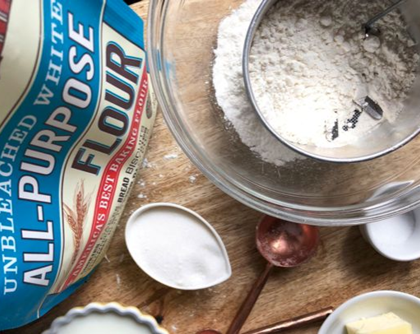 step 1 Sift All-Purpose Flour (1 1/2 cups), Baking Powder (2 tsp), Salt (1/2 tsp) and Granulated Sugar (3 Tbsp) into a large bowl.