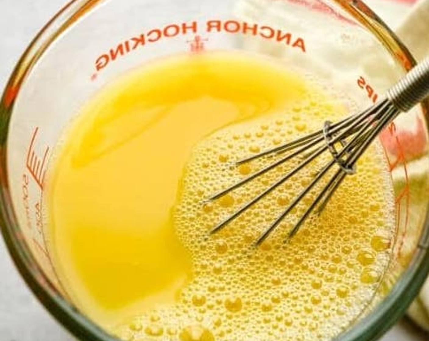 step 7 In a small bowl whisk together the Chicken Stock (1 1/2 cups) and Eggland's Best Classic Egg (1).
