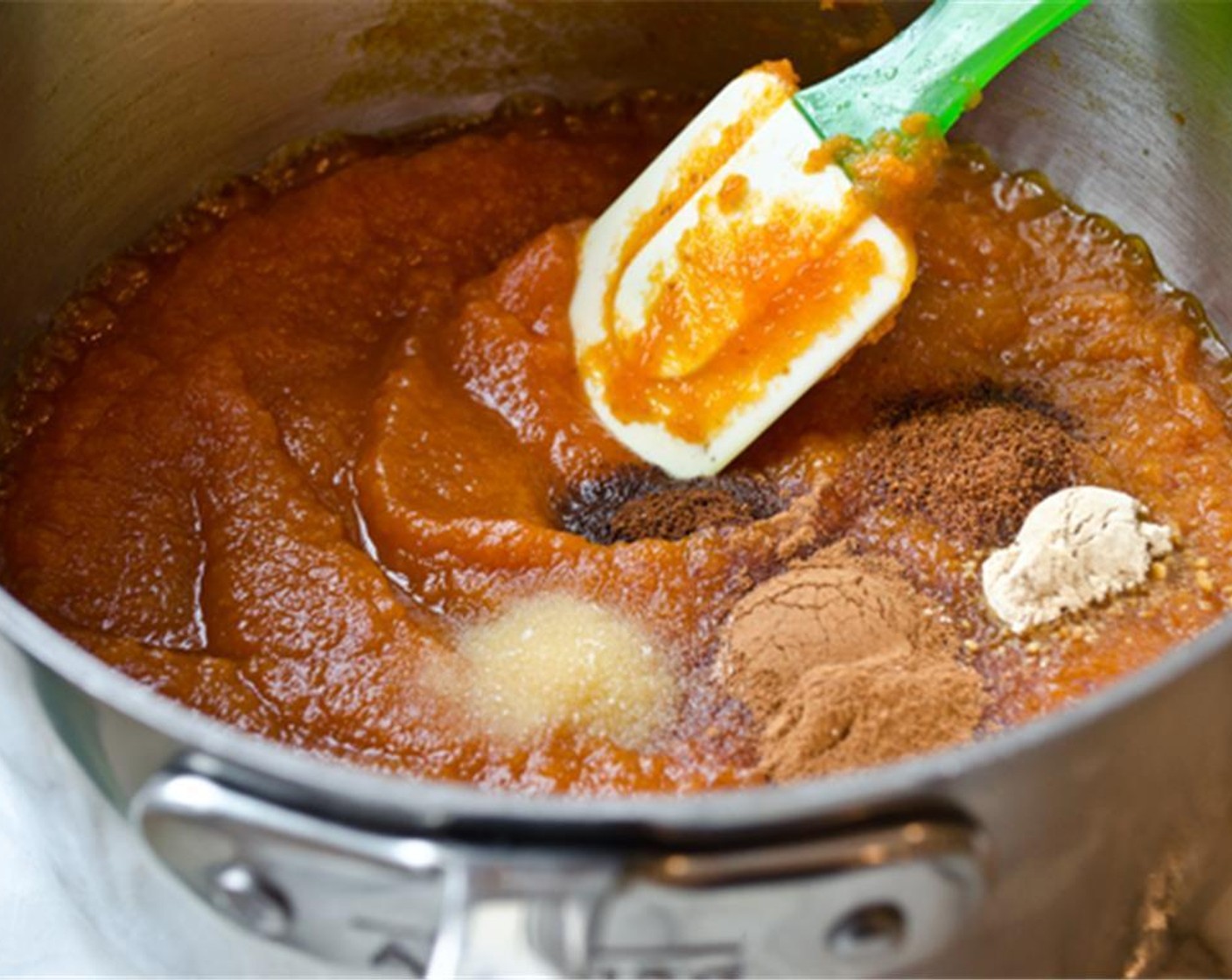 step 5 For the filling, bring about 4 quarts of water to a simmer in a tea kettle. In a small saucepan, stir together the Canned Pumpkin Purée (1 can), Granulated Sugar (1 1/3 cups), Simply Organic Cinnamon, Ground (1 tsp), Ground Ginger (1/2 tsp), Ground Nutmeg (1/4 tsp), Ground Cloves (1/4 tsp), and Salt (1/2 tsp).